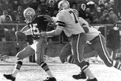 Starr being sacked by Cowboys.